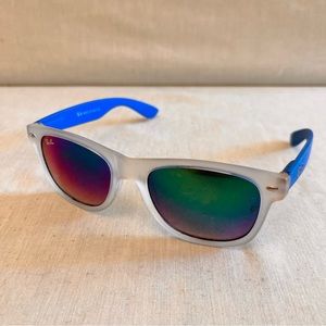 A pair of RAY BAN Sunglasses - Unisex